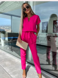 R&B | Eleganter Jumpsuit mit kurzen Ärmeln und Gürtel