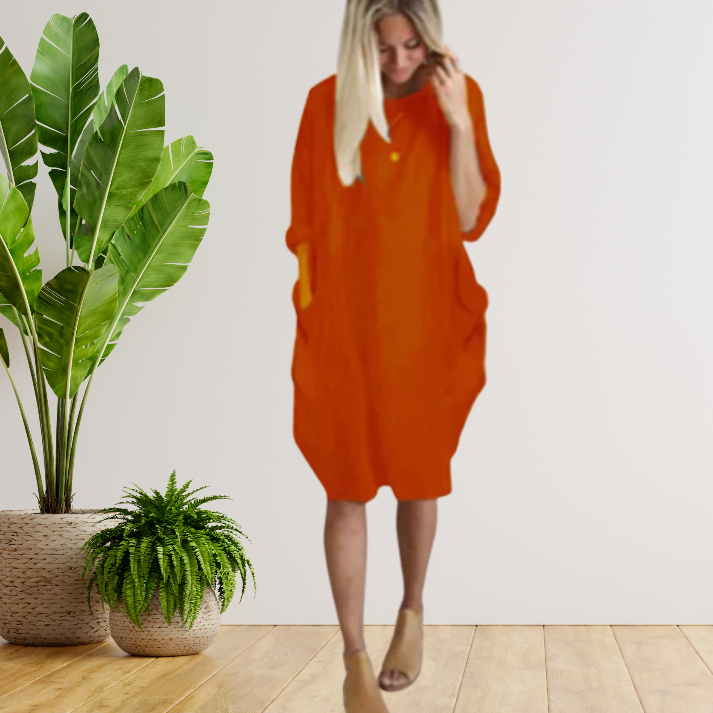 Langärmeliges lockeres Taschenkleid