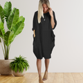 Langärmeliges lockeres Taschenkleid