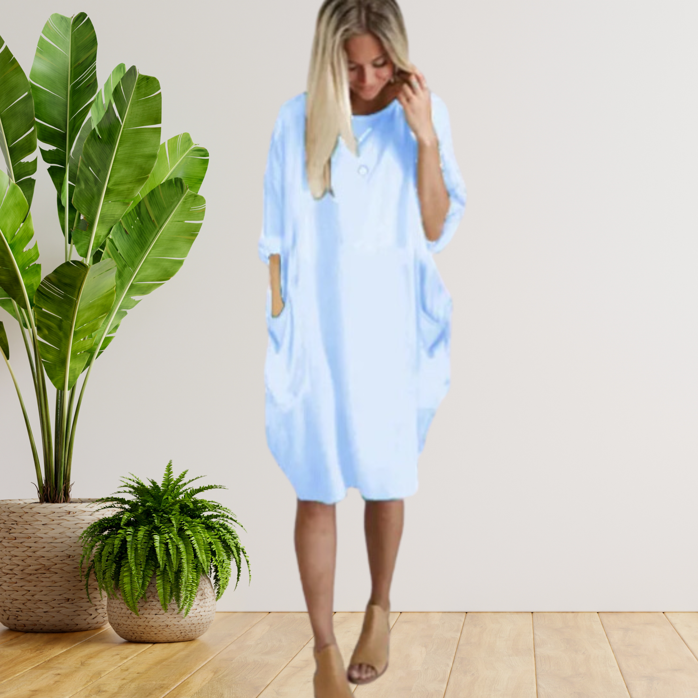 Langärmeliges lockeres Taschenkleid