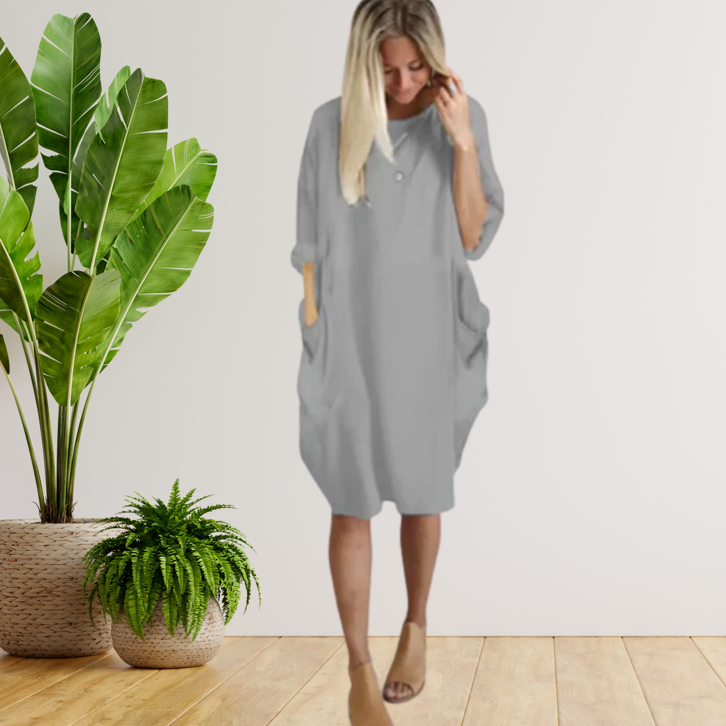 Langärmeliges lockeres Taschenkleid
