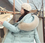 R&B | Lange Winterjacke - Puffer-Design - Kunstfellkapuze - Taillierter Gürtel - Warm und Isolierend