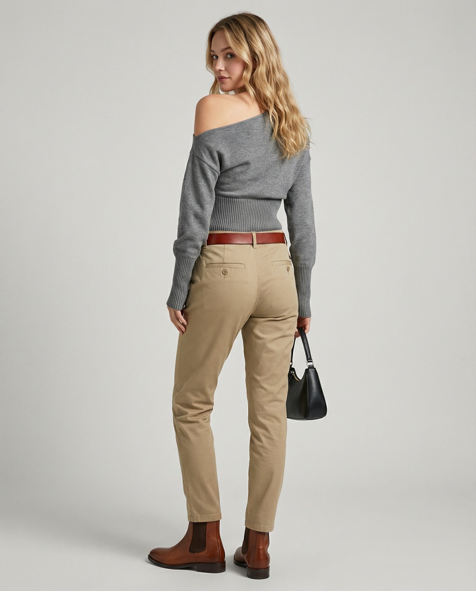 Taillierter Damen Strickpullover mit schräger Schulter in modernem Design