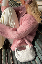 R&B | Lässiger Strickpullover mit Knöpfen und Rundhalsausschnitt. Oberbekleidung
