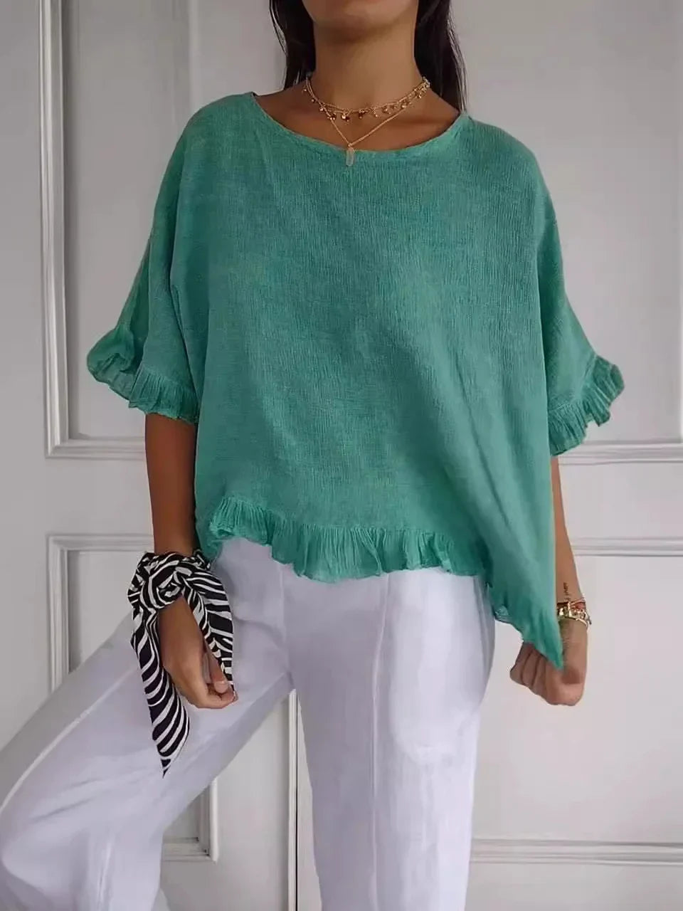 Feminine Rüschenbluse aus hochwertigem Stoff