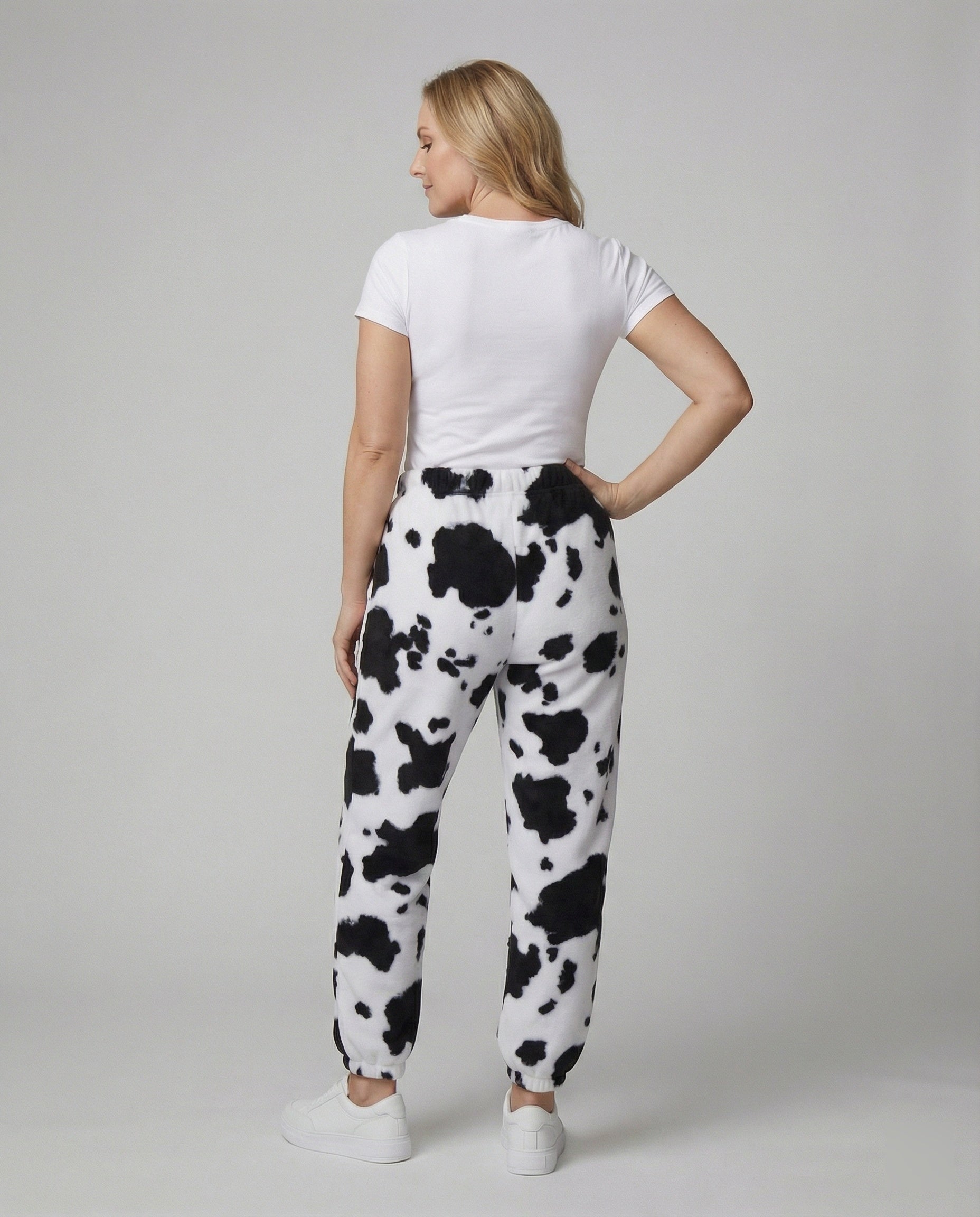 Damen Freizeithose im lässigen Cow-Print-Design mit elastischem Bund und Bündchen