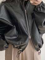 R&B | Schwarze Jacke mit Kordelzug und Kragen