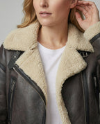 Damen Kunstlederjacke mit Kunstfellkragen