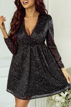 Elegante schwarze Glitzerkleid mit Netzbespannung