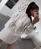 Oversize Musselin Bluse Glitzer Auge Beige