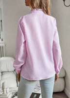 Modische Bluse mit langen Ärmeln und Streifenmuster