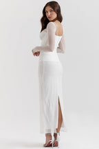 R&B | Elegantes Maxikleid mit tiefem Ausschnitt und langen Ärmeln