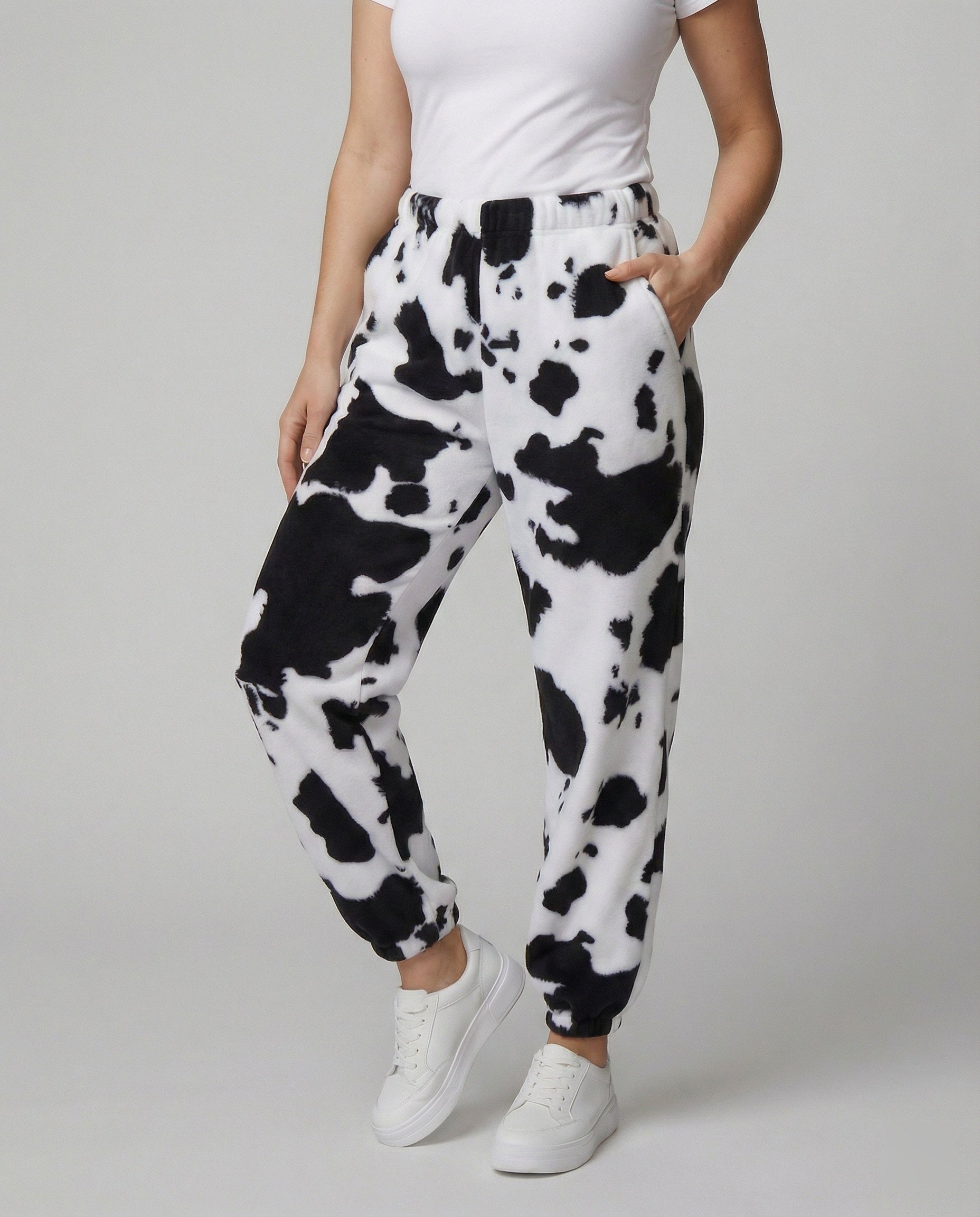 Damen Freizeithose im lässigen Cow-Print-Design mit elastischem Bund und Bündchen