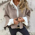 – Stilvolle mittellange Jacke
