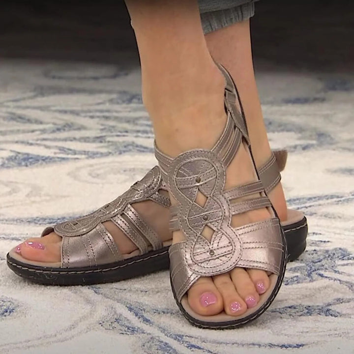 Stilvolle ergonomische Sandalen mit Fußstütze