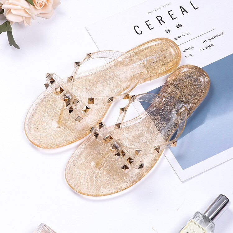 Flip-Flop-Sandalen mit Schleifen und Nieten